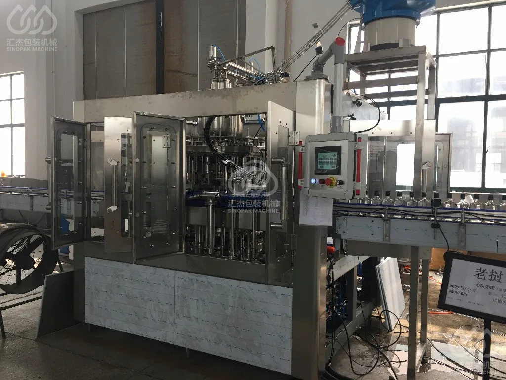 Liquor & Alcohol Filling Machine (Glass bottle ROPPCrown metal cap)