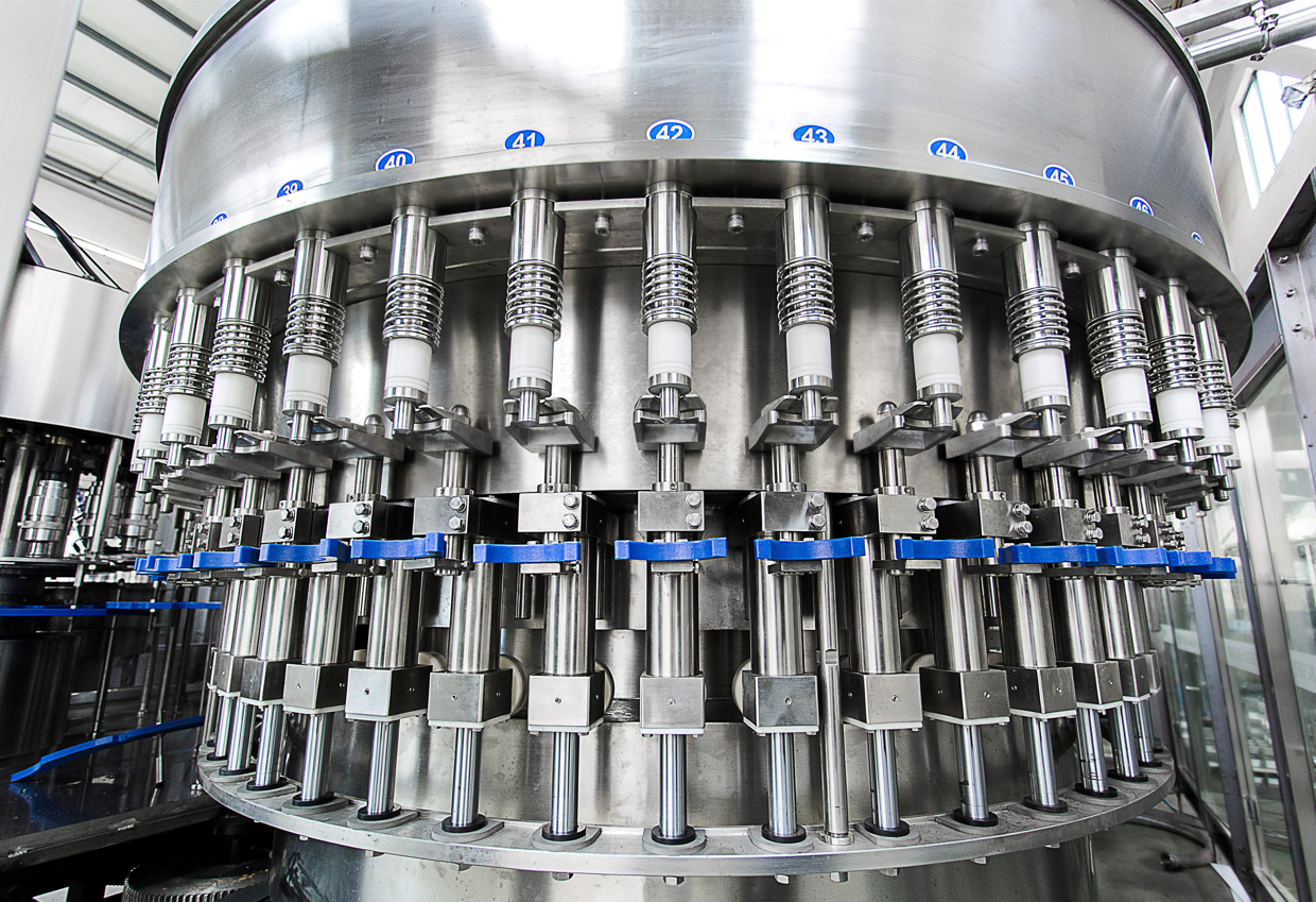 Máquina automática de lavado y llenado de botellas de plástico XGF50-50-15 de 24000&nbsp;XNUMX BPH